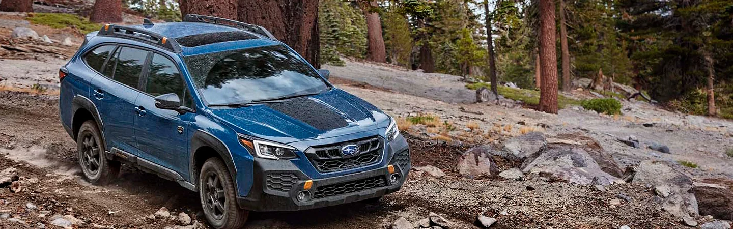 2025 Outback Wilderness vs Toyota RAV4 bluecolor frontview