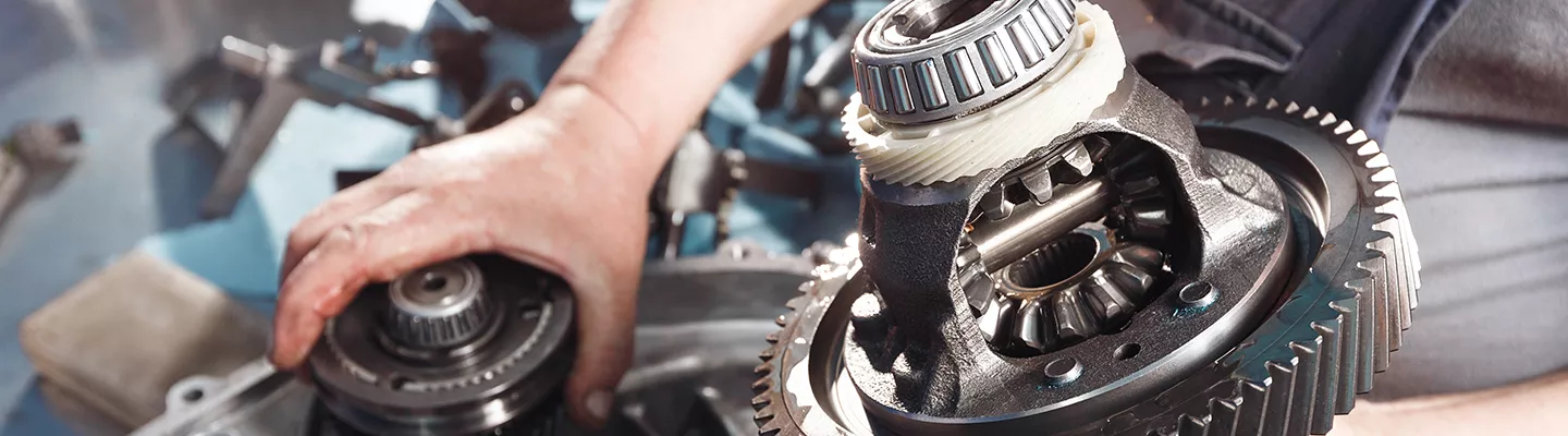 Mechanic working with car parts