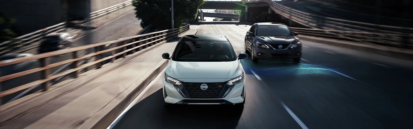 2025 Nissan Sentra front view blue on parking garage