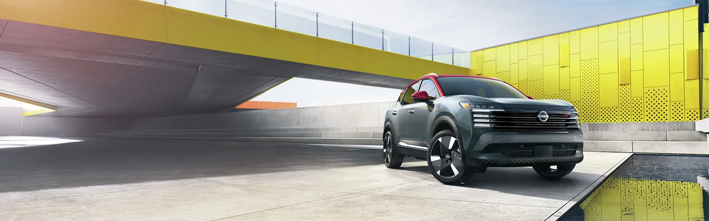 a front view of a silver 2026 Nissan Kicks