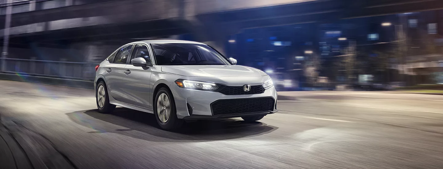 2026 Honda Civic driving on a highway