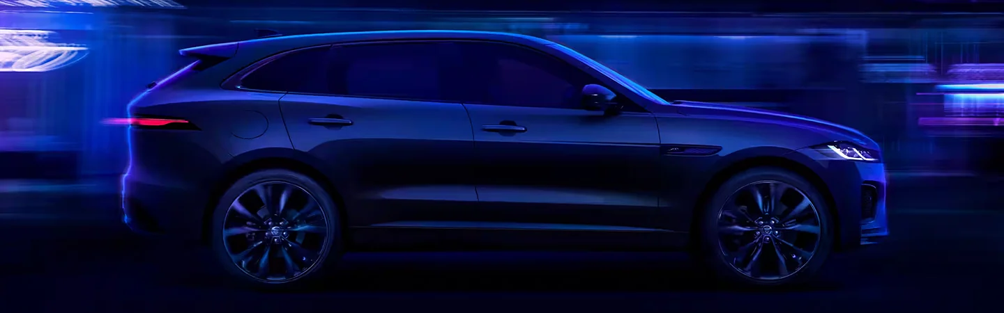 2024 Jaguar E-PACE vs Range Rover Evoque Right side blue