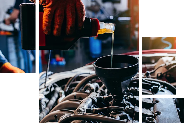 auto mechanic checking car with another employee
