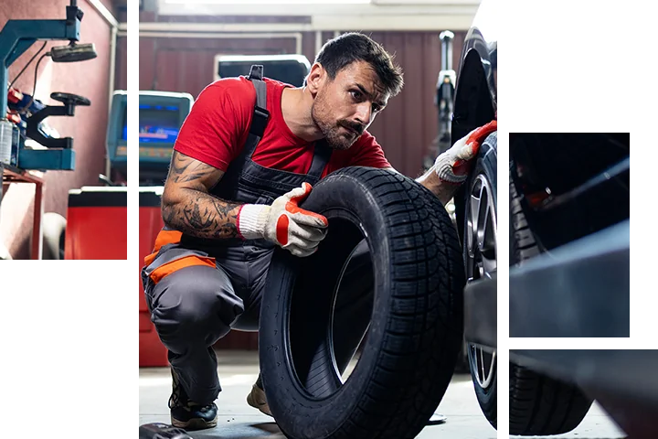 auto mechanic with tire ready to mount
