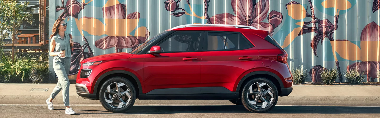 2024 Hyundai Venue Specs red color sideview