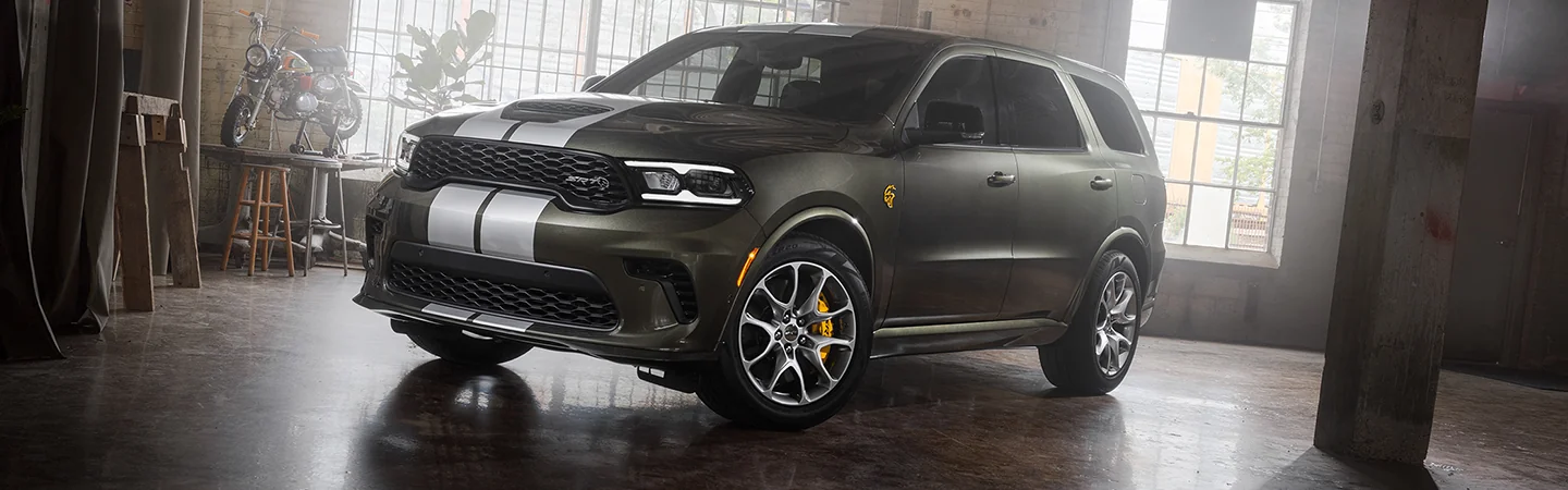 Front view of a prked 2026 Dodge Durango in a stuido shop