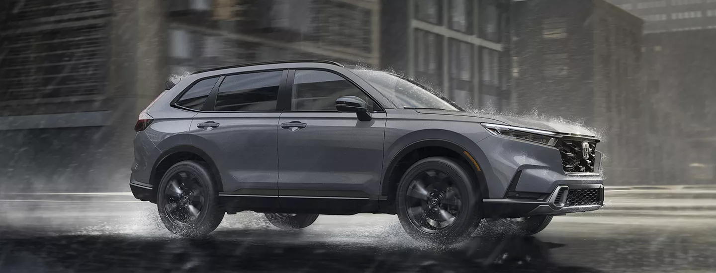 2026 Honda CR-V Hybrid driving in the rain