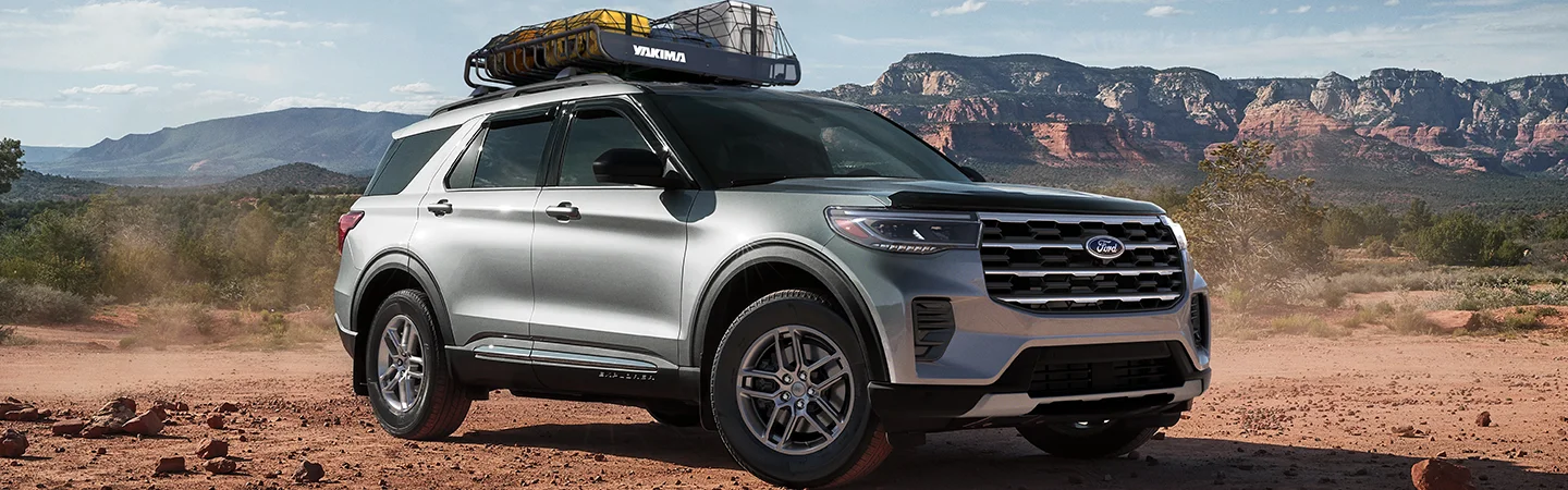 silver 2026 Ford Explorer with junk on roof