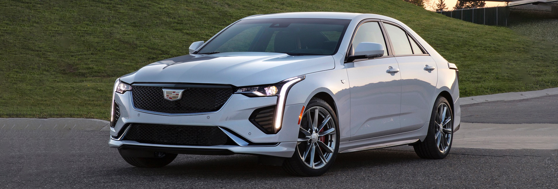 A white 2021 CT4 driver view in motion 