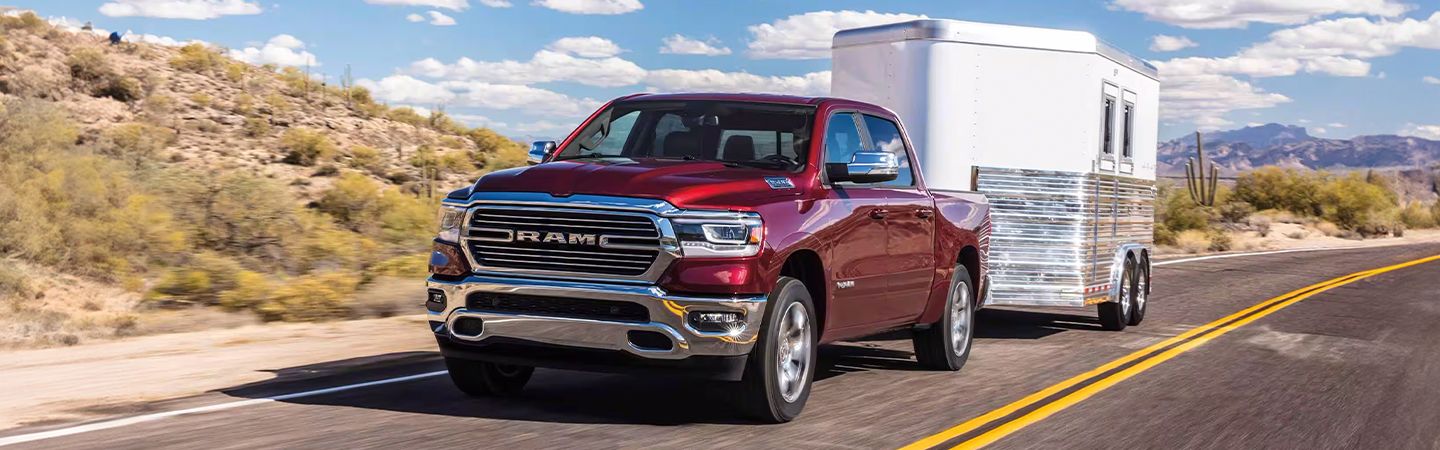 2024 RAM 1500 vs Chevrolet Silverado red color front view