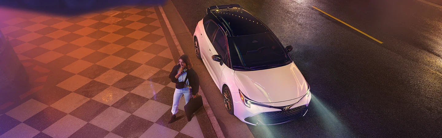 Top view of a parked white 2025 Toyota Corolla Hatchback