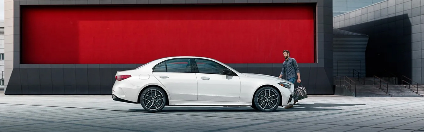 2024 Mercedes-Benz C-Class Specs side front in white 