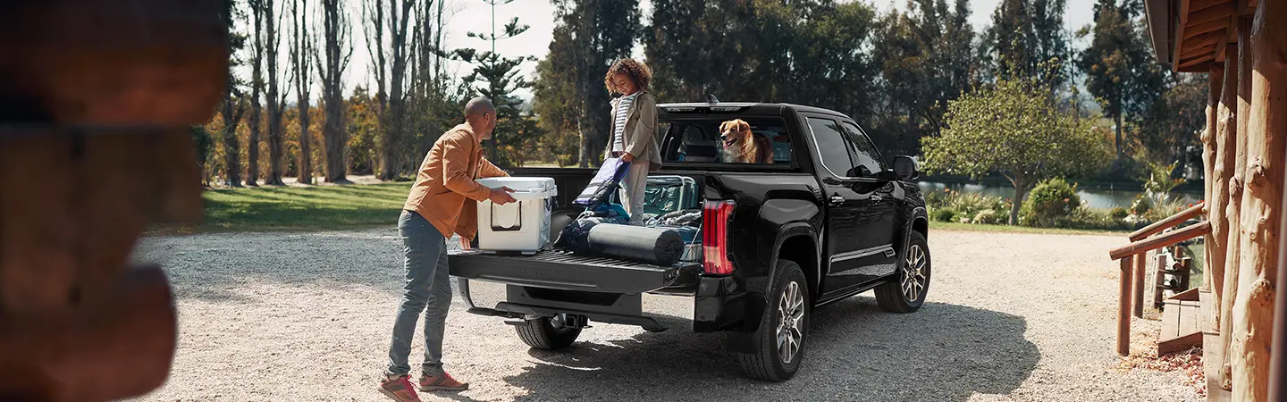 family in truck bed at filling station 2026 Toyota Tundra
