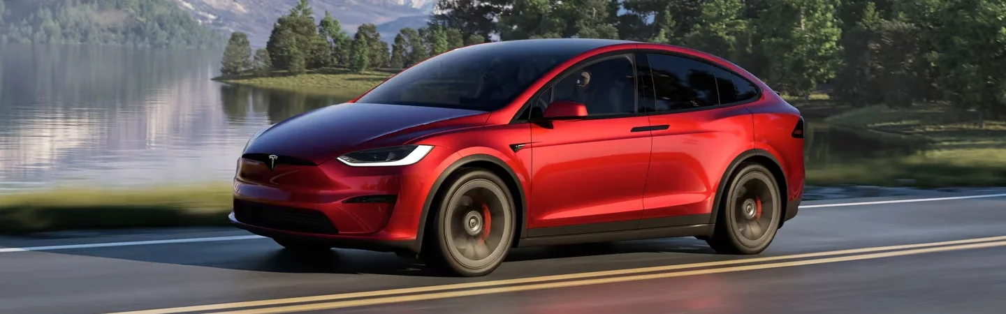 2024 Jaguar I-PACE vs Tesla Model X front side in red