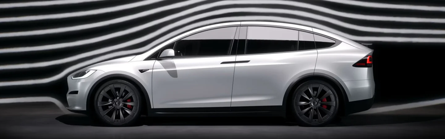 2024 Jaguar I-PACE vs Tesla Model X side front in white