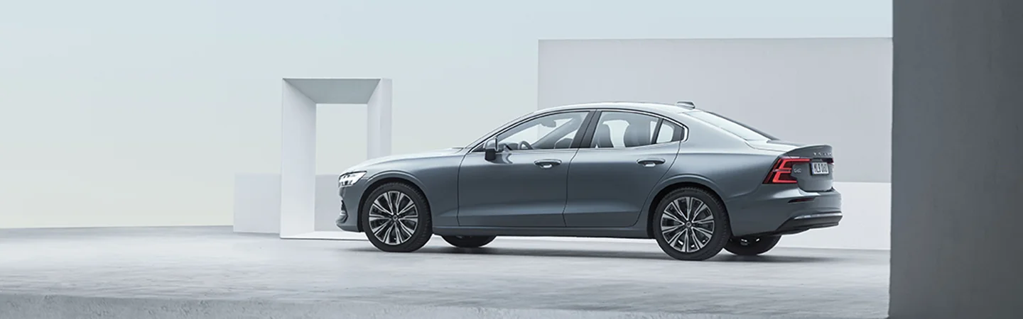 Side view of a parked gray 2025 Volvo S60