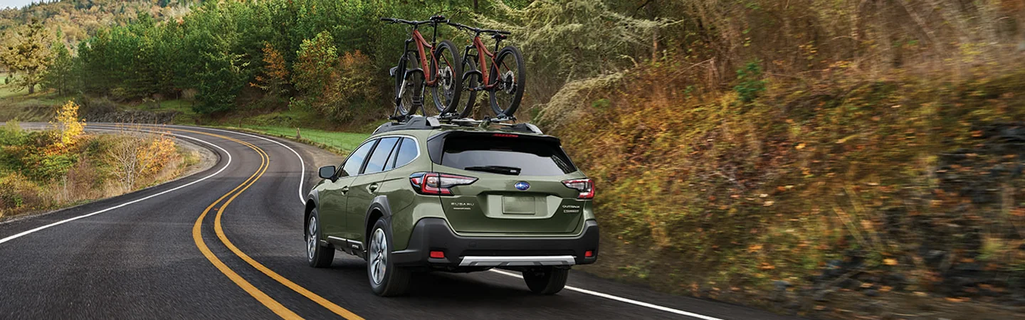 2025 Subaru Outback driving on back road in Waco, TX
