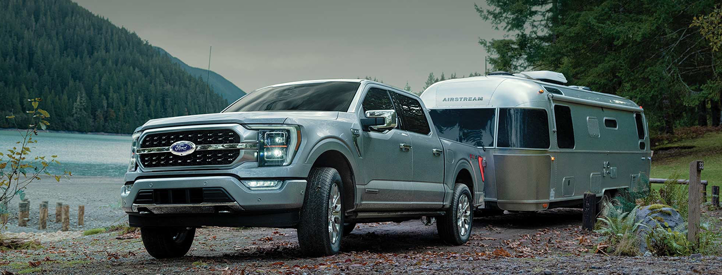 2023 Ford F-150 pulling Airstream by lake