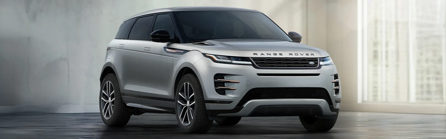 Profile view of a gray parked 2025 Range Rover Evoque