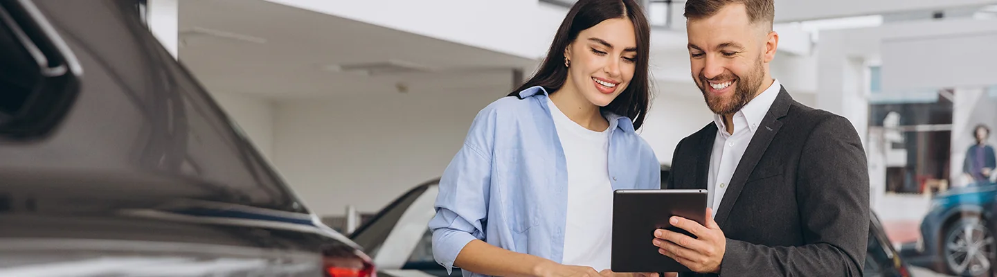 Sales person talking to customer about lease options