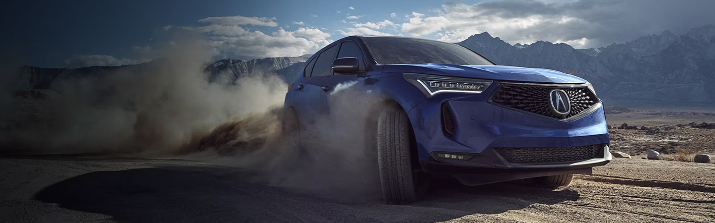 2024 Acura RDX Specs side front in blue