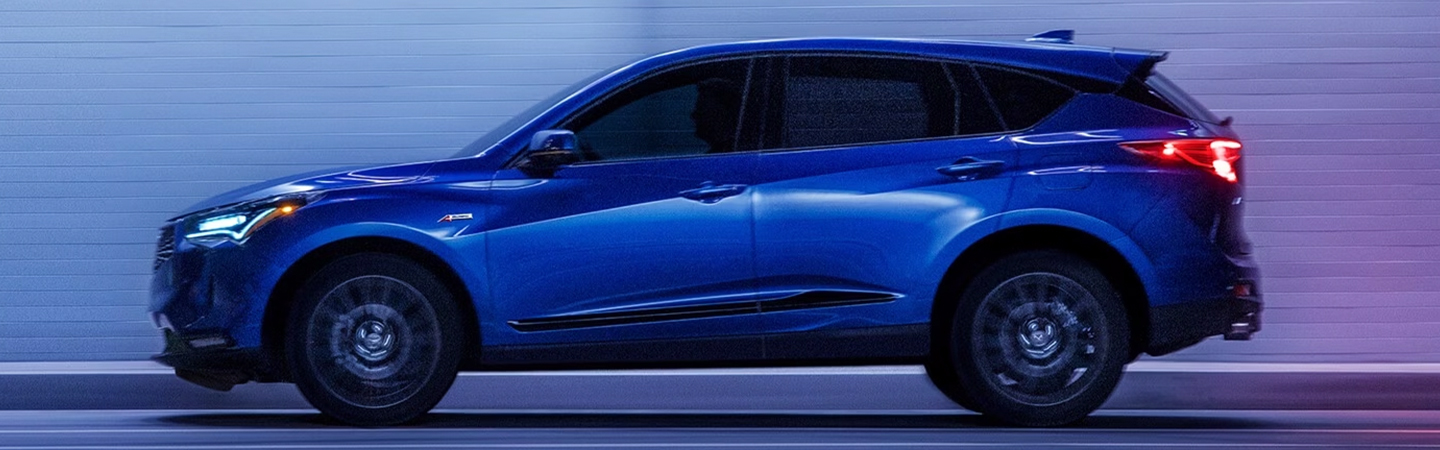 2024 Acura RDX Specs side front in blue