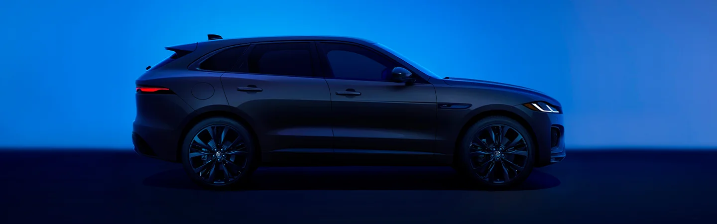 blue 2025 Jaguar F-PACE side view