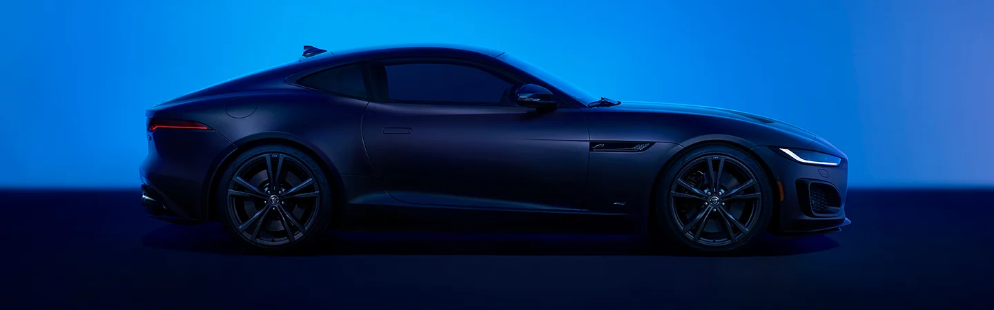 passenger side view of black 2024 Jaguar F TYPE P450 R Dynamic