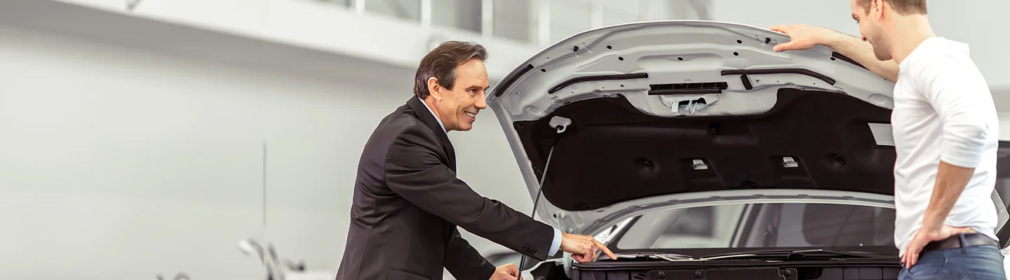 Alfa Romeo Maintenance tech talking to customer about there car