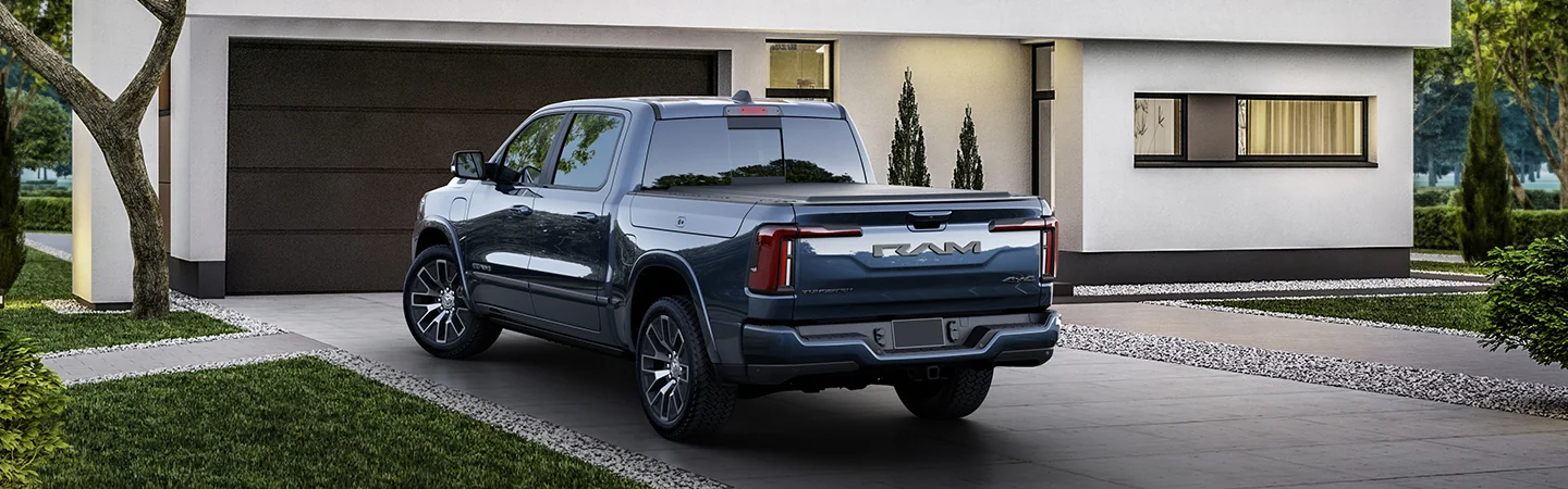 2025 RAM 1500 vs Ford F-150 color blue and back view