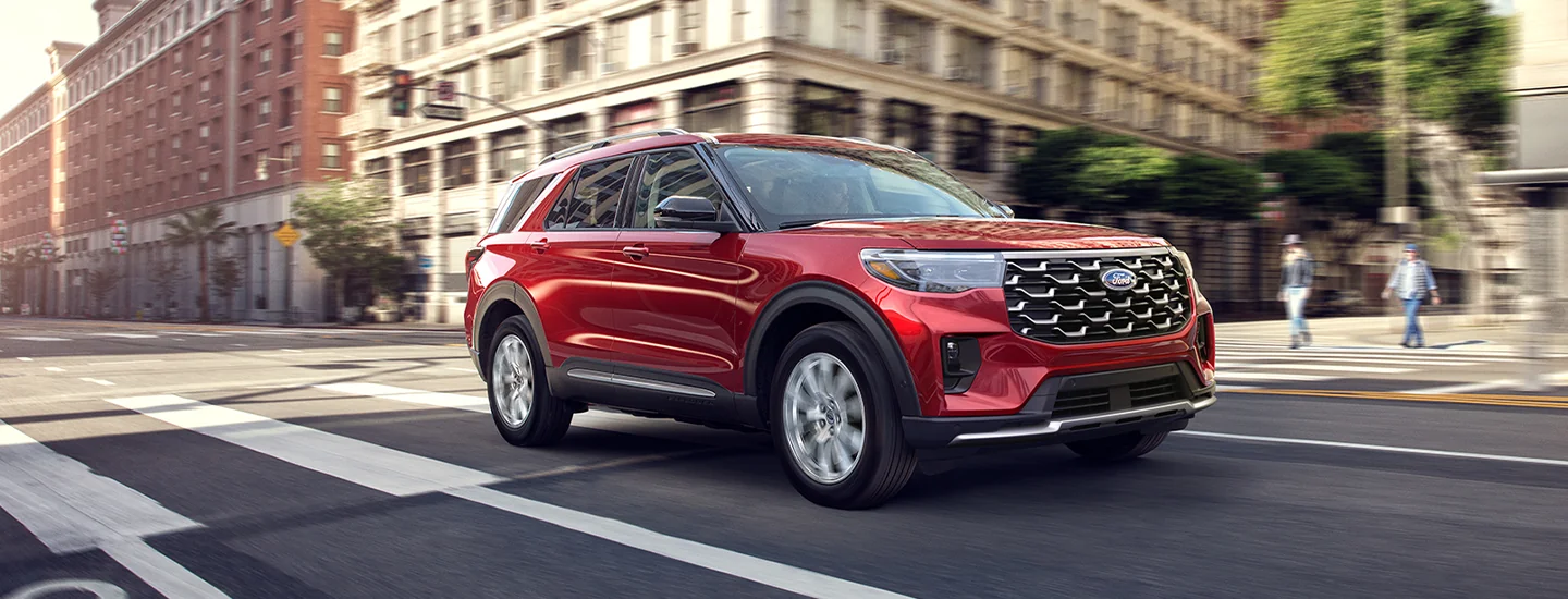 front view of a red 2026 Ford Explorer in Port Richey, FL in motion