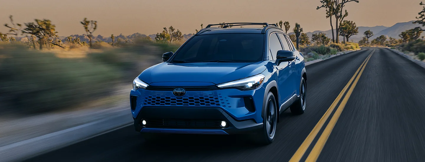 front view of a blue 2026 Toyota Corolla Cross L