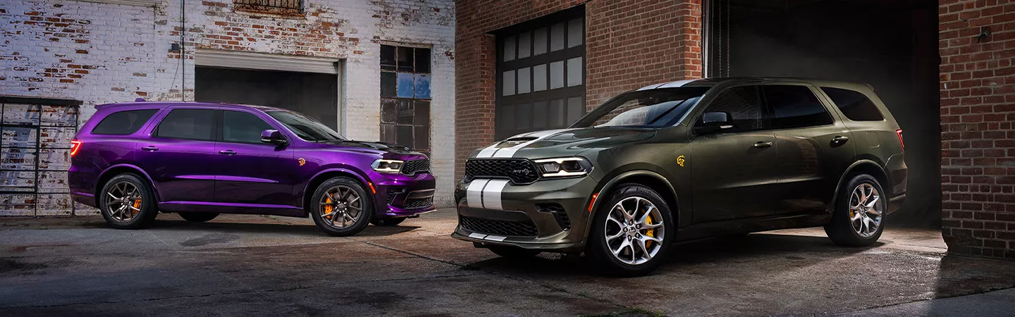 Purple 2026 Dodge Durango and green 2026 Dodge Durango side by side