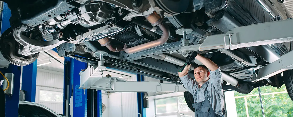 tech working under car