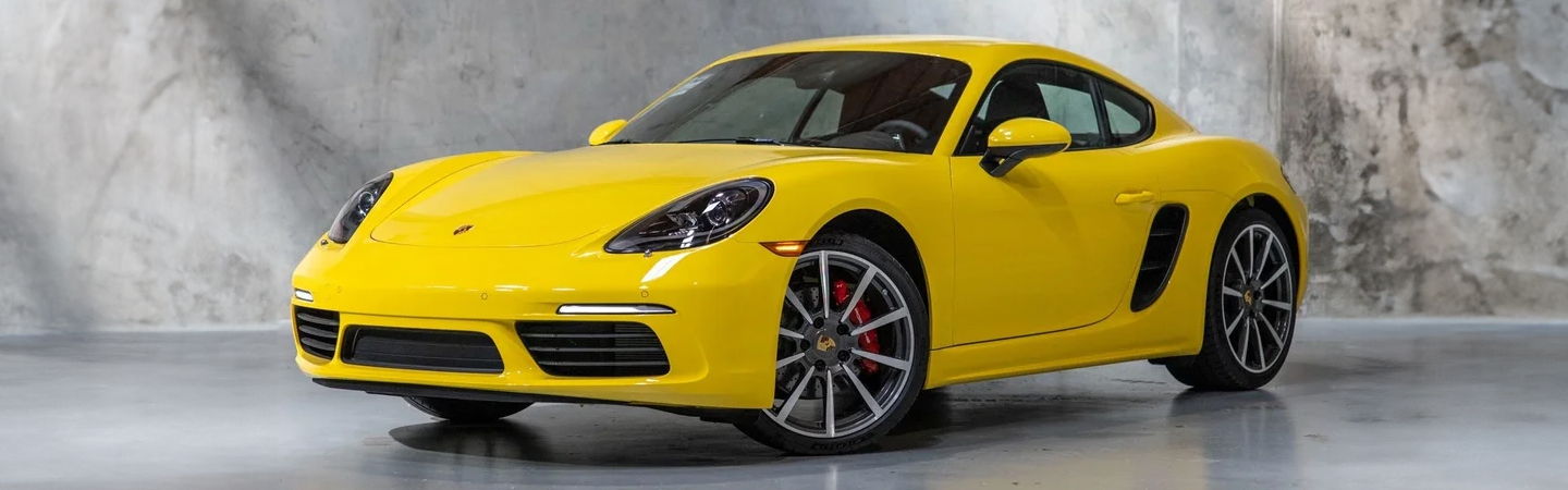 2024 Porsche 718 Cayman Specs yellow frontview