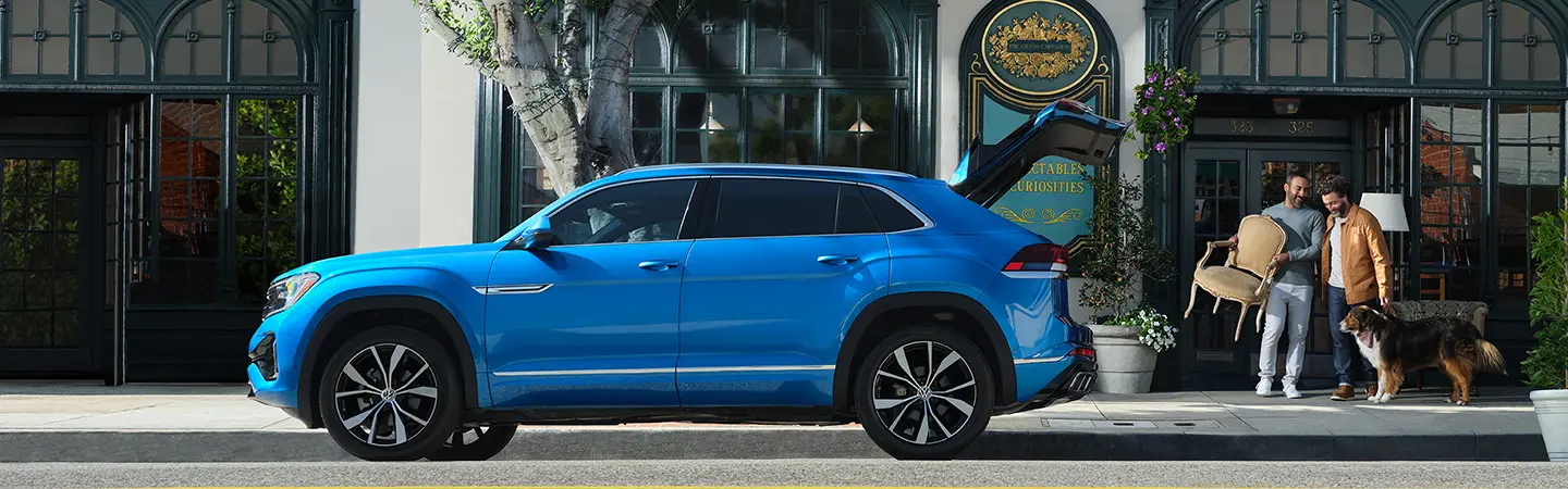 blue 2026 Volkswagen Atlas Cross Sport on the street