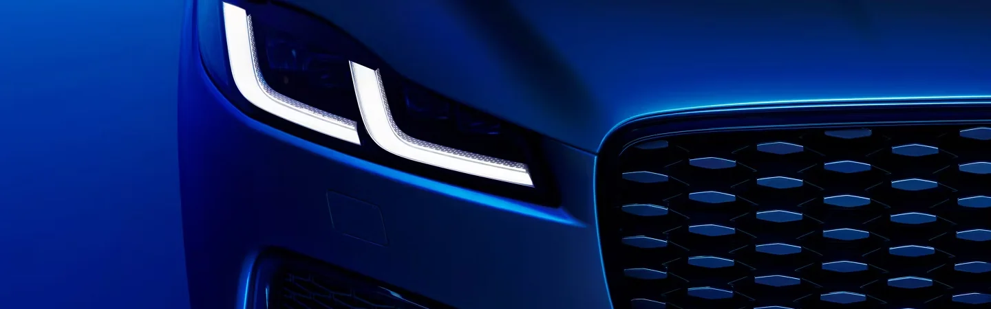 2025 Jaguar F-PACE Specs front headlight in blue