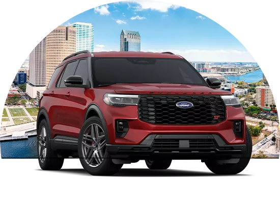 red SUV parked in front of a cityscape