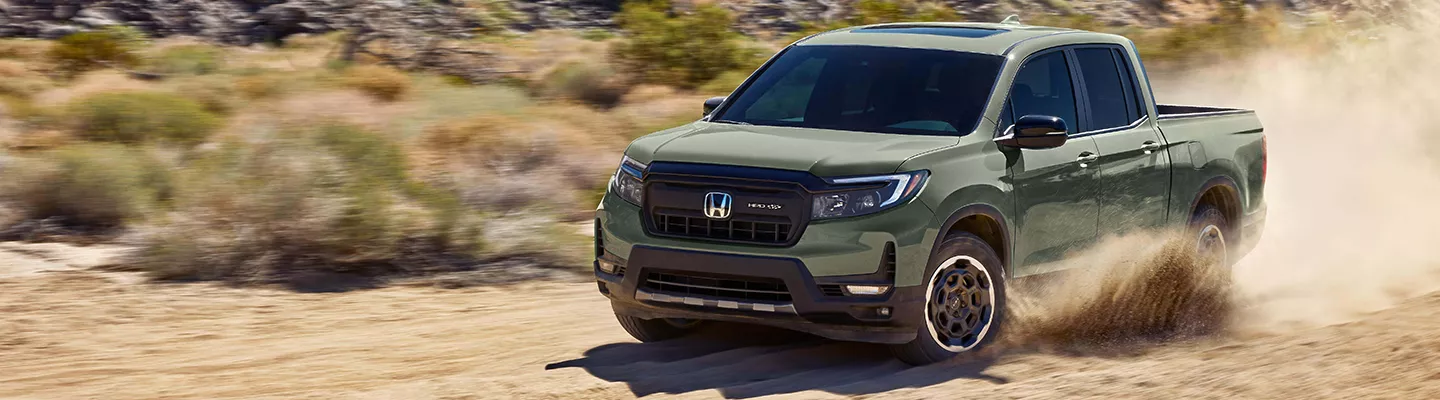 2026 Honda Ridgeline driving in the sand