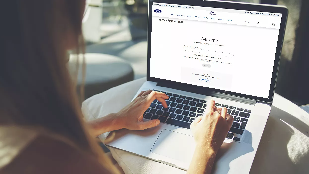 Women scheduling appointment on her laptop