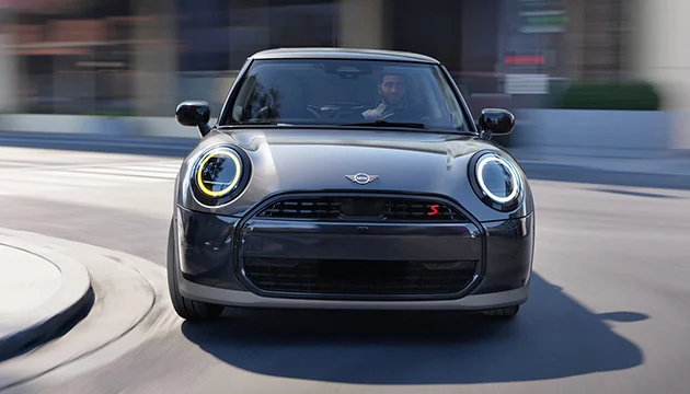 front view of a MINI model turning a corner