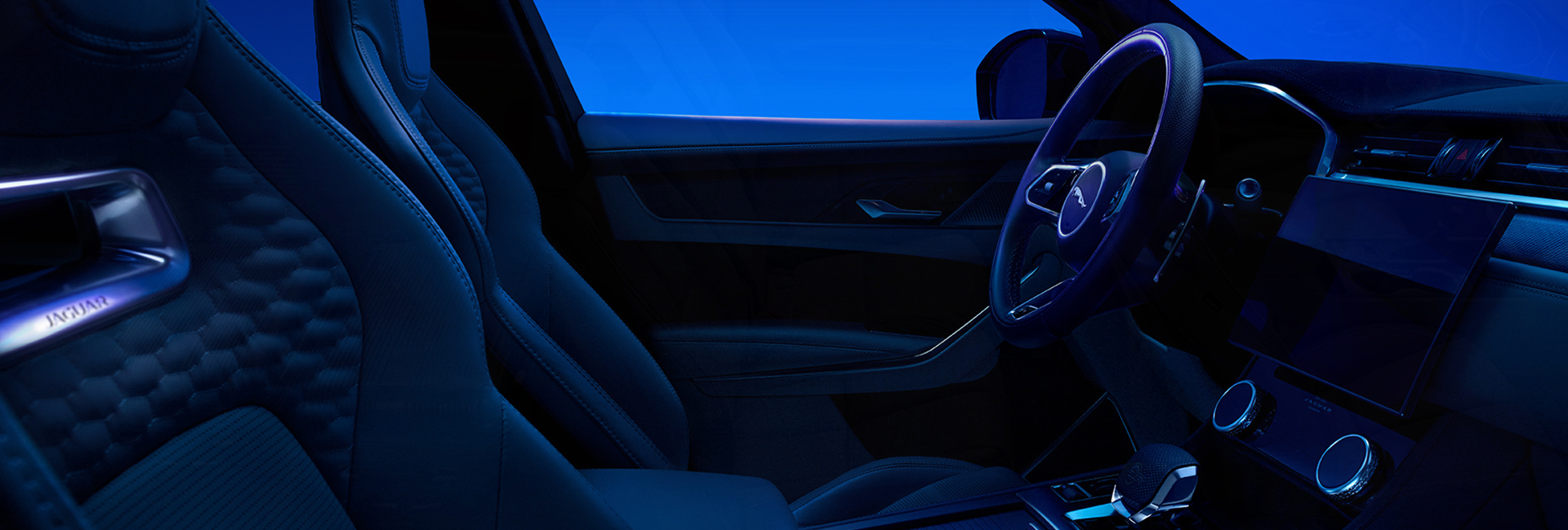 Interior view of the front seat of a 2025 Jaguar F-PACE