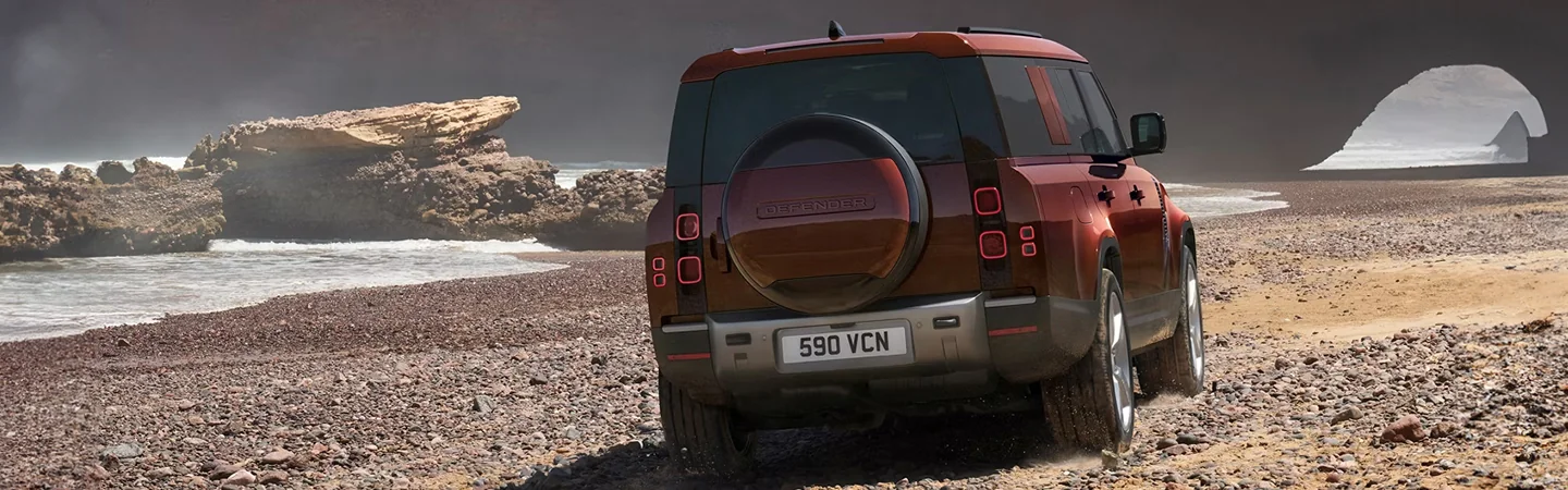 2024 Defender 130 Specsback side in brown