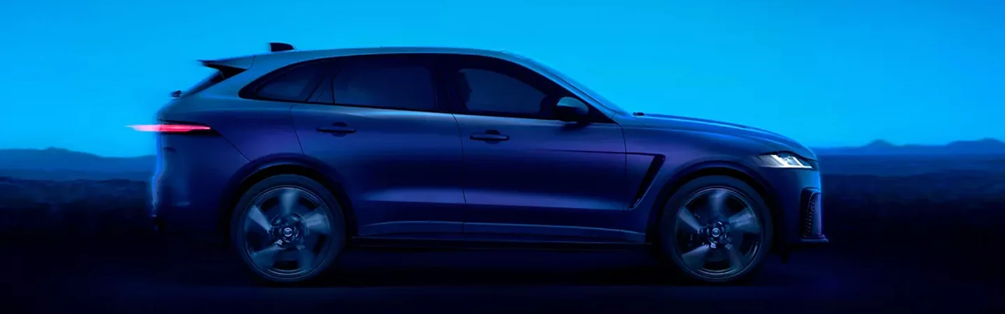 2024 Jaguar F-Pace vs 2024 BMW X5 side front in blue