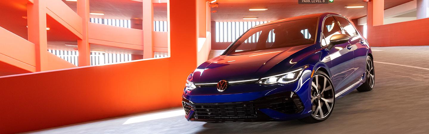 2022 Volkswagen Golf R front view driving down garage levels