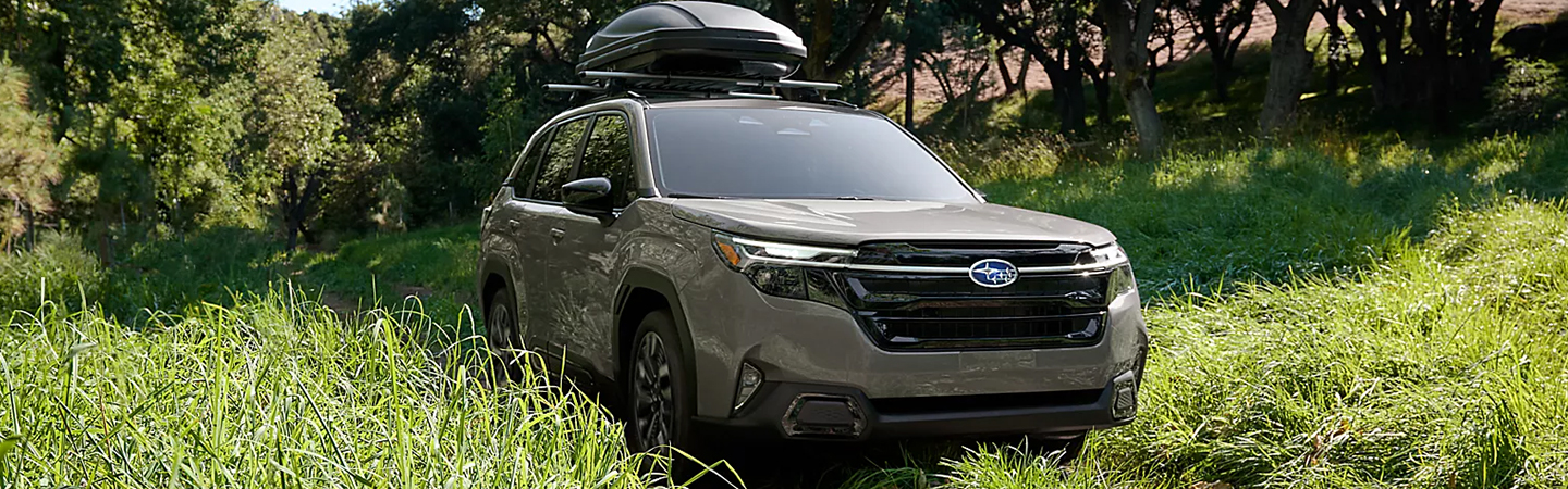 2024 Subaru Forester vs Nissan Rogue silvercolr sideview