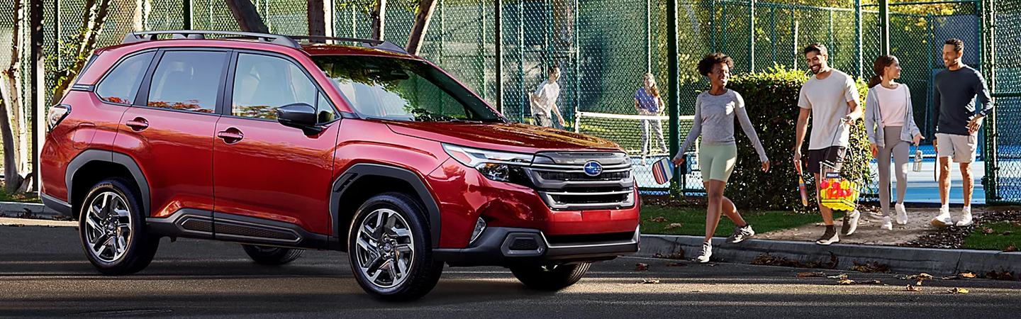 2024 Subaru Forester vs Nissan Rogue bluecolor topview