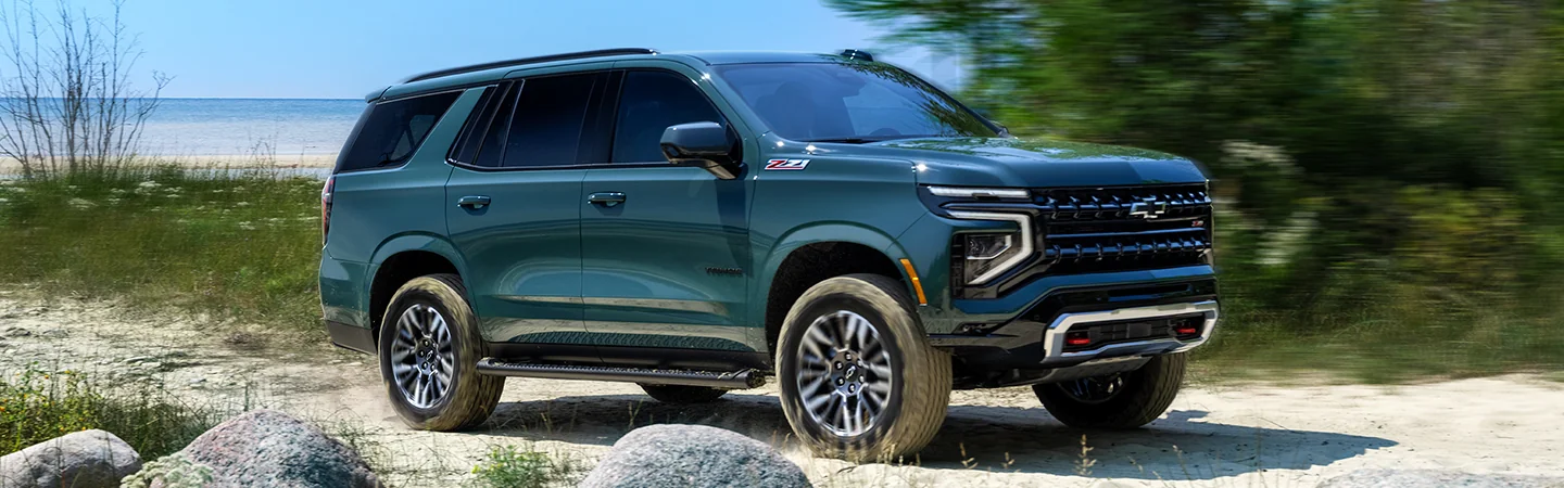 2025 Chevrolet Tahoe at the beach light blue