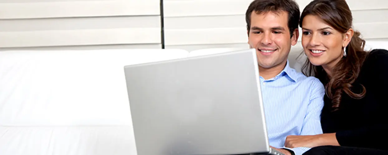 smiling people with laptop