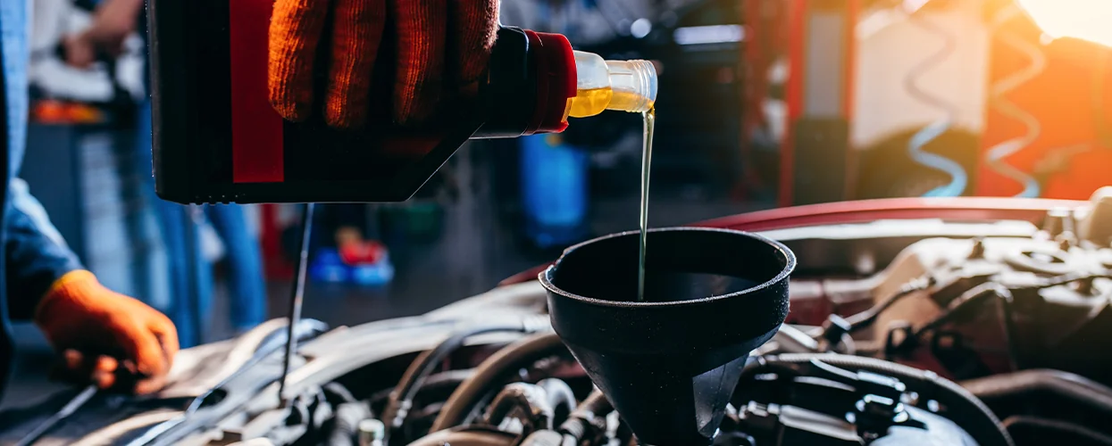 Close up of oil change service being done